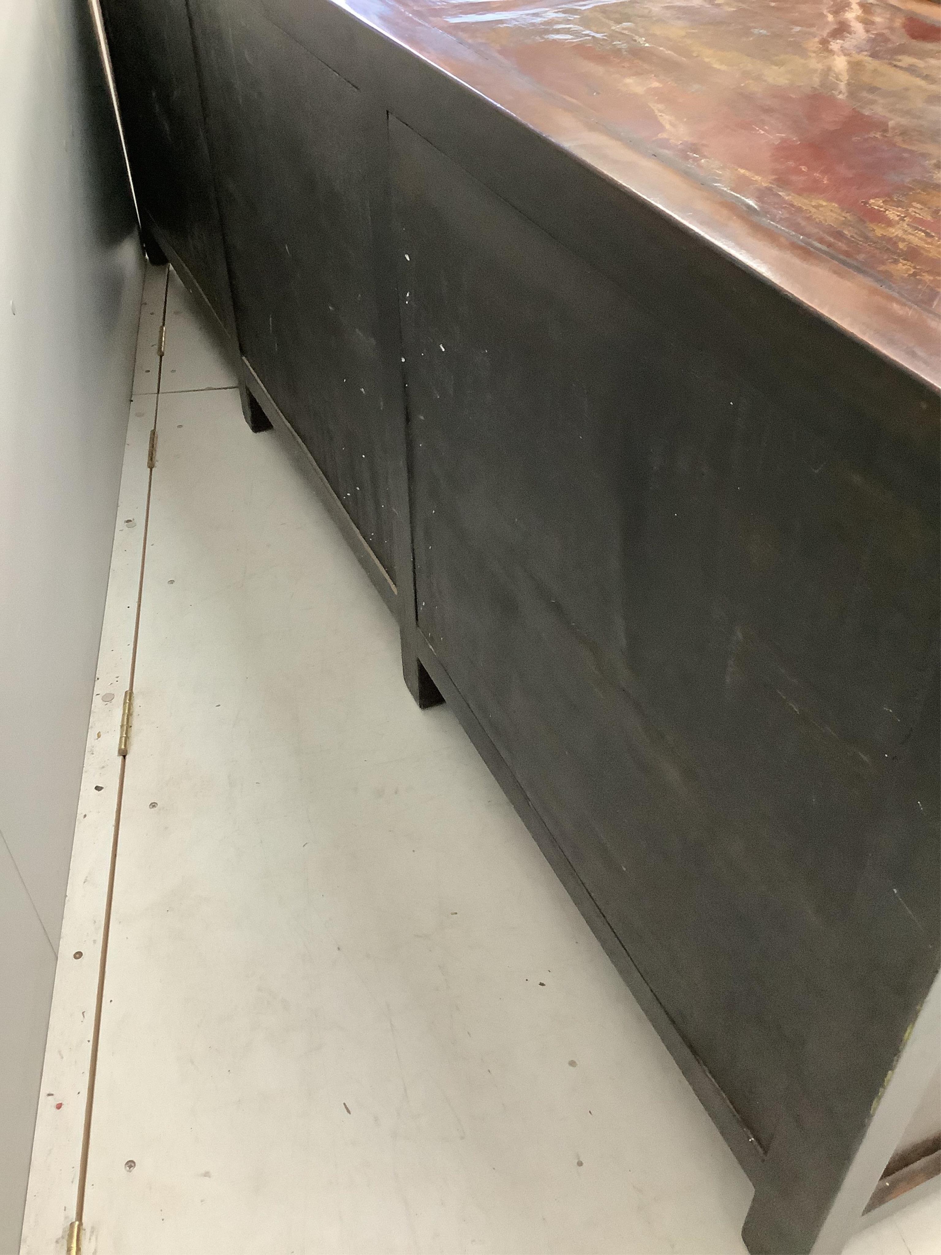 A large Chinese painted and lacquered sideboard, width 235cm, depth 46cm, height 80cm